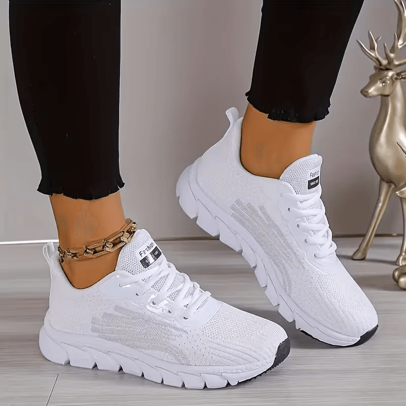 Strider — Atletische mesh-sneaker met gesegmenteerde zool