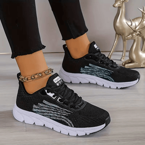 Strider — Atletische mesh-sneaker met gesegmenteerde zool