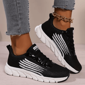 Strider — Atletische mesh-sneaker met gesegmenteerde zool