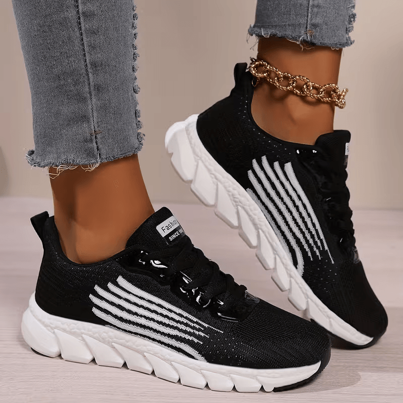 Strider — Atletische mesh-sneaker met gesegmenteerde zool