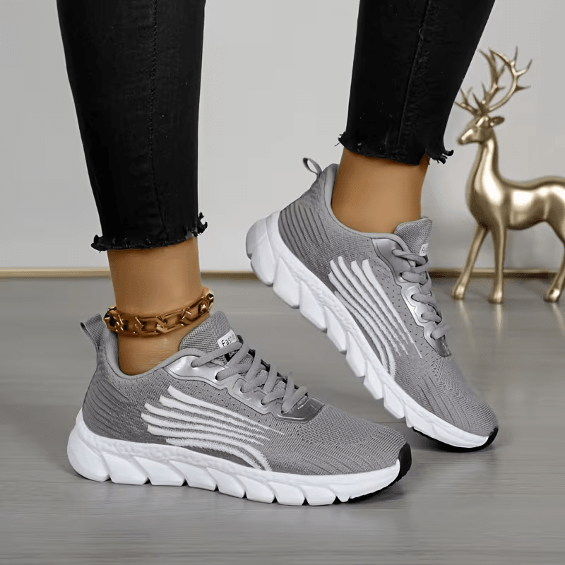Strider — Atletische mesh-sneaker met gesegmenteerde zool