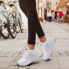 Strider — Atletische mesh-sneaker met gesegmenteerde zool