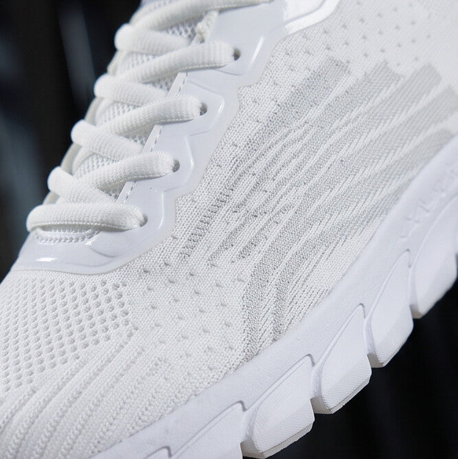 Strider — Atletische mesh-sneaker met gesegmenteerde zool