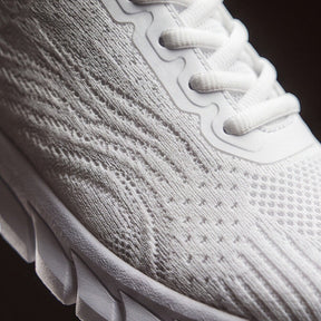 Strider — Atletische mesh-sneaker met gesegmenteerde zool
