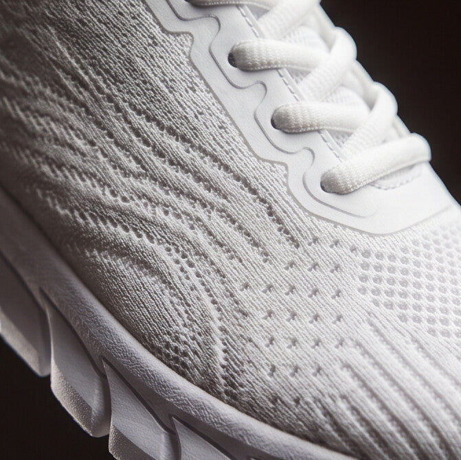 Strider — Atletische mesh-sneaker met gesegmenteerde zool