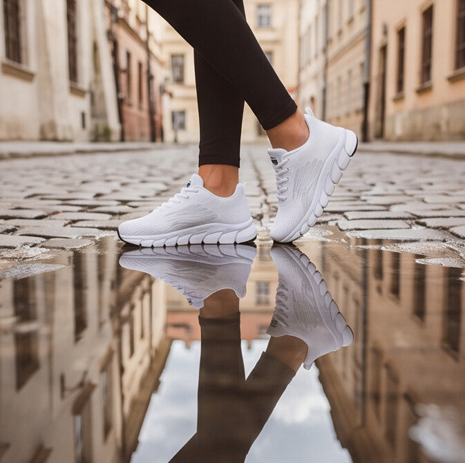 Strider — Atletische mesh-sneaker met gesegmenteerde zool